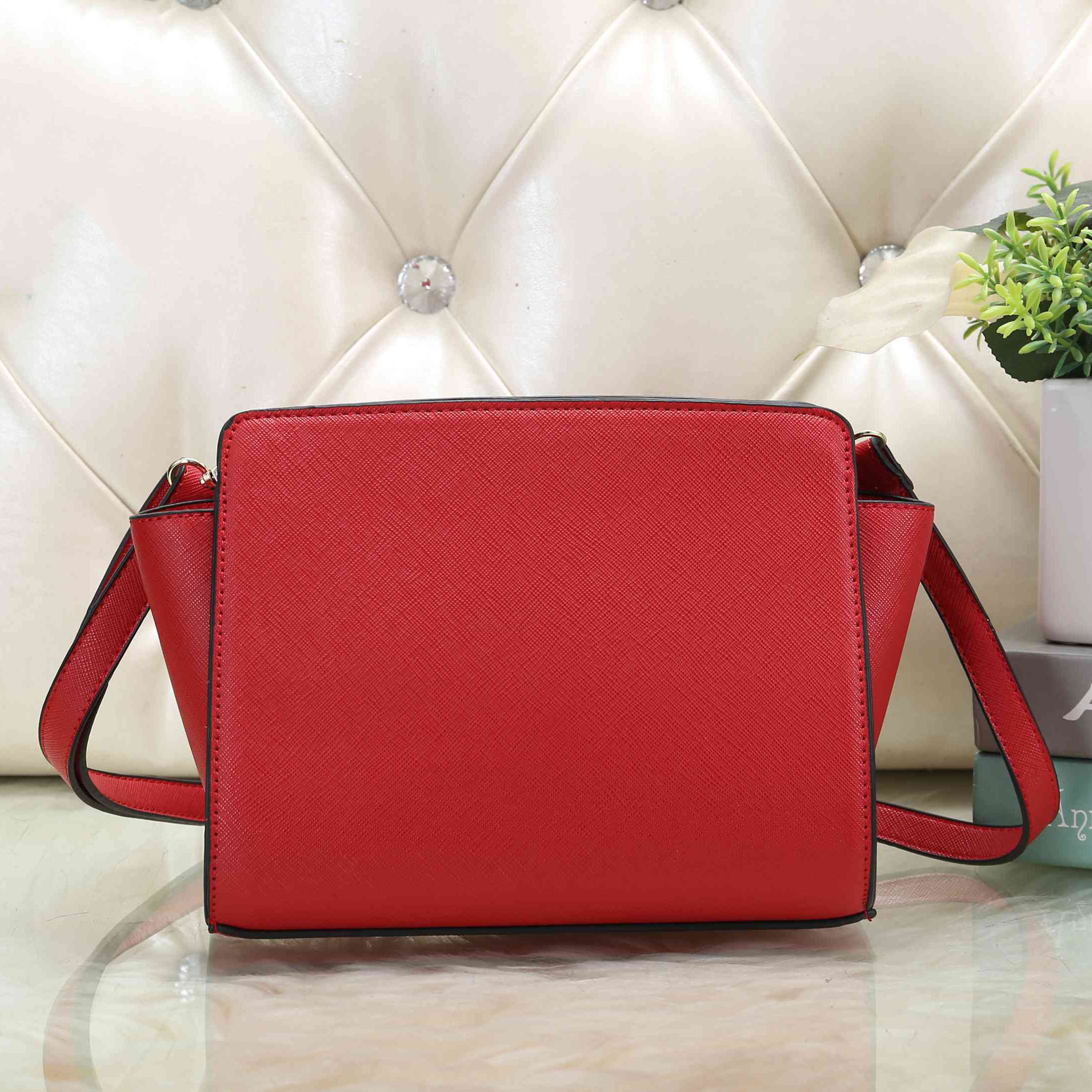 black weave crossbody bolsa