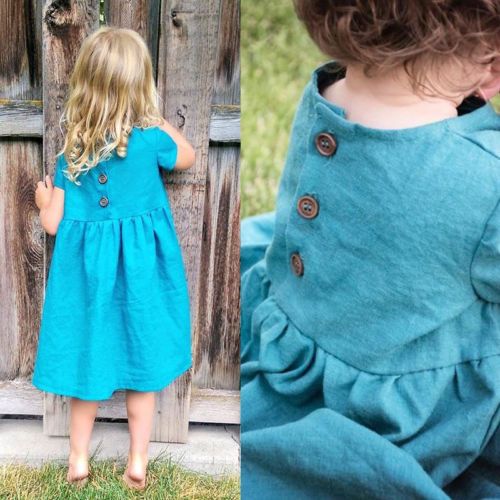 cute baby with blue dress