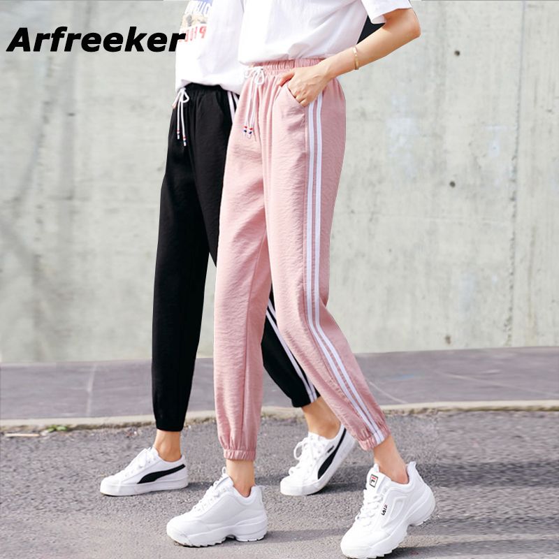 Acquistare Leggings Da Donna Firmati Moda Pantaloni Sportivi Casual  Pantaloni A Righe Laterali Vita Allentata Elastico Abbigliamento Sportivo  Pantaloni Da Donna Nuovi Pantaloni 2018 Economico | Consegna Veloce E  Qualità | It.Dhgate