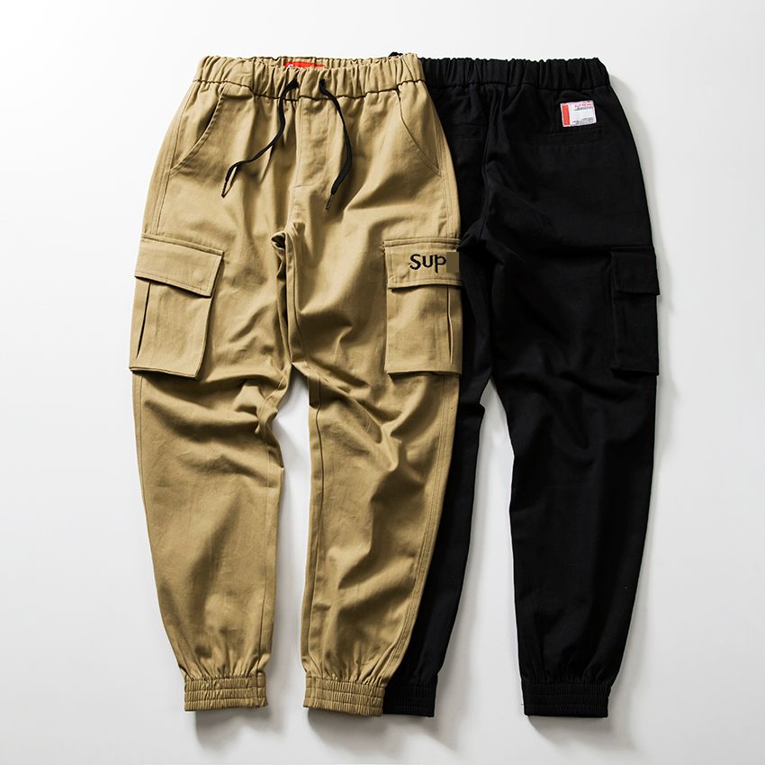 Pantalones de diseñador para hombre de Suprême UU. Tendencia casual skateboard marca pantalones de chándal Múltiples bolsillos pie pantalones de chándal calle hip nuevos mujeres pantalones cortos