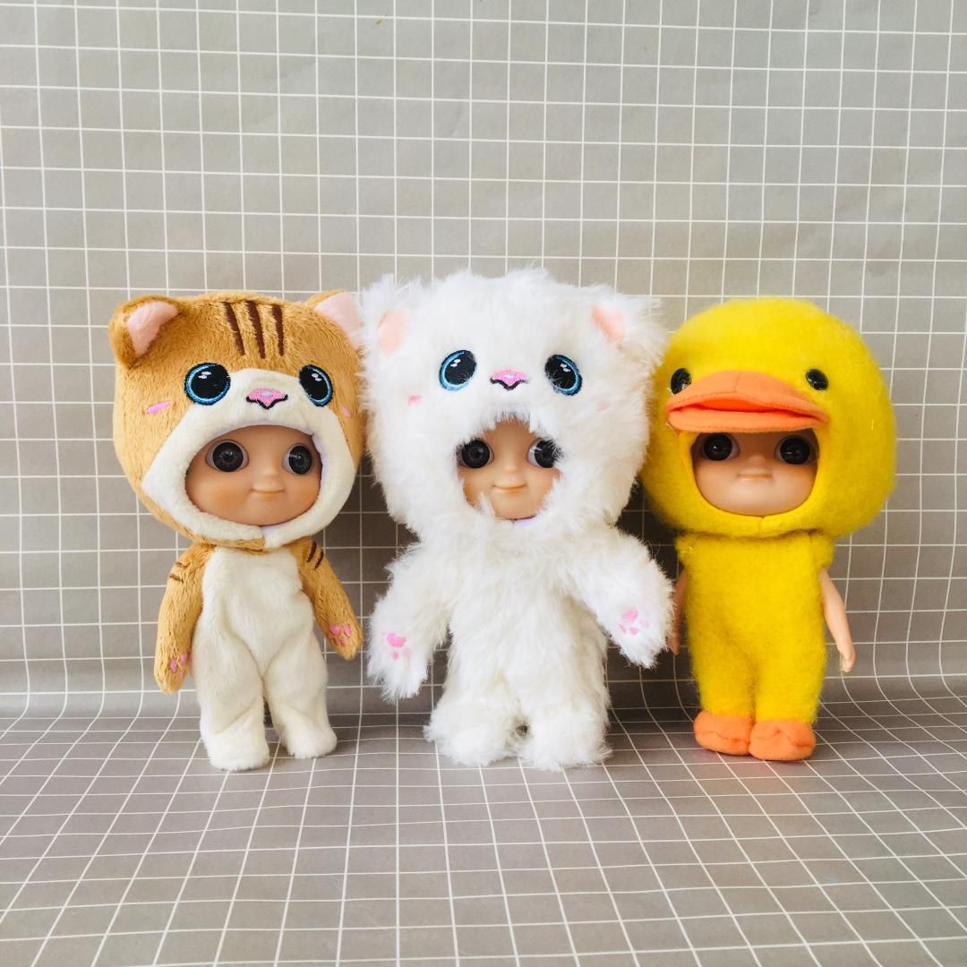 dolls with big heads and eyes