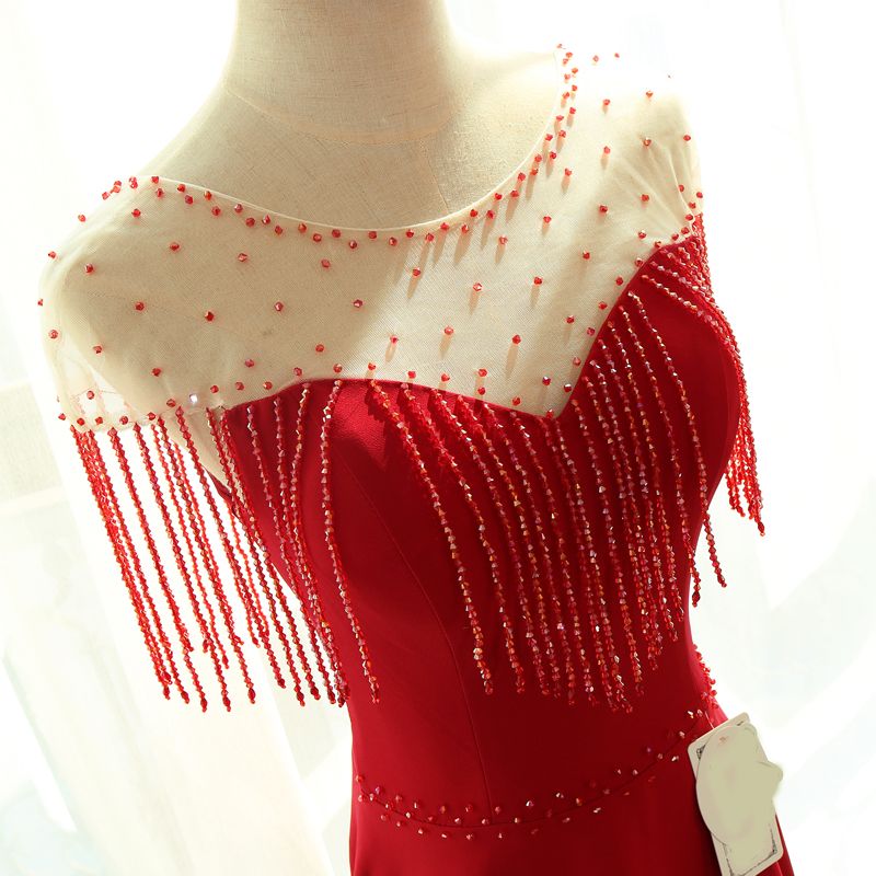 red dress with tassels