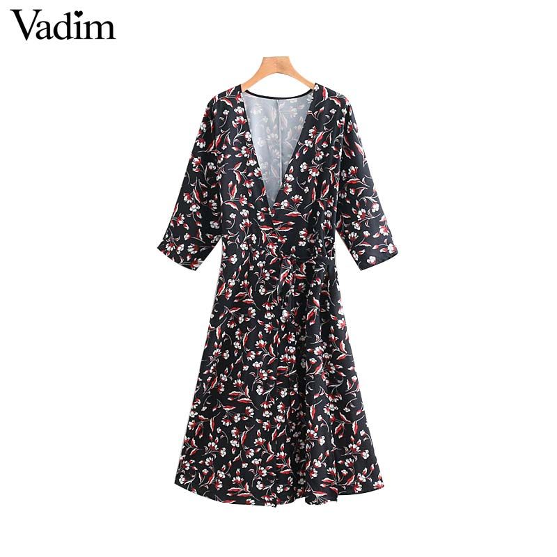 three quarter sleeve wrap dress