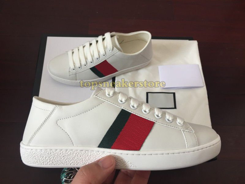 white trainers gold stars