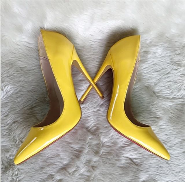 yellow and black pumps