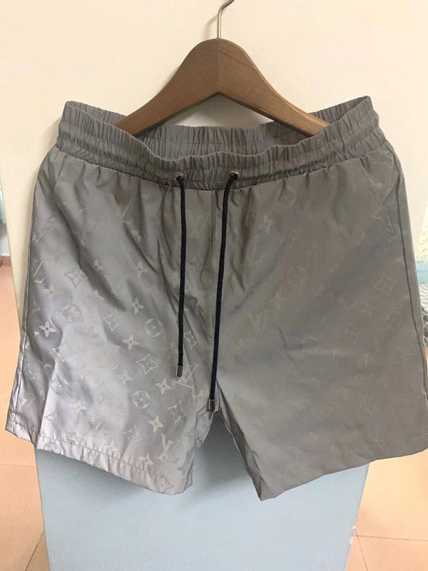 khaki polo shorts with horses