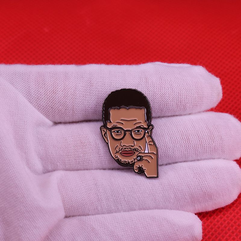 Malcolm X lapel pin