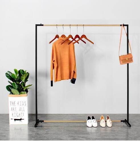 Pacífico vóleibol negocio Soporte para pisos de metal Estantes para tiendas en tiendas de ropa Un estante simple y moderno para colgar ropa con un marco de pórtico en el suelo Pacífico vóleibol negocio Soporte para pisos de metal Estantes para tiendas en tiendas de ropa Un estante simple y moderno para colgar ropa con un marco de pórtico en el suelo