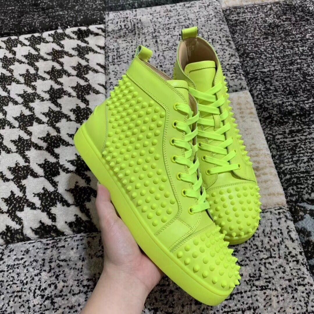 red bottom studded sneakers