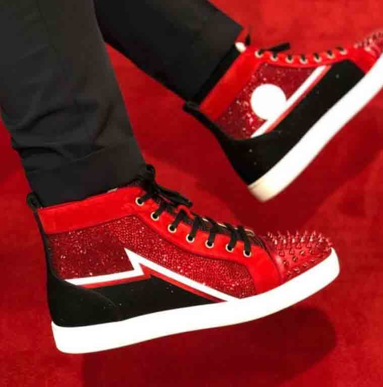 red bottom spiked sneakers