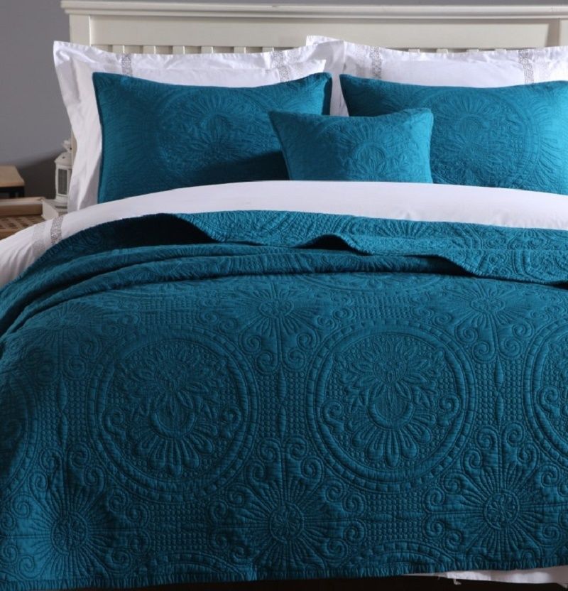 white cotton quilted bedspread