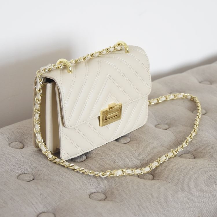 white shoulder bag with chain