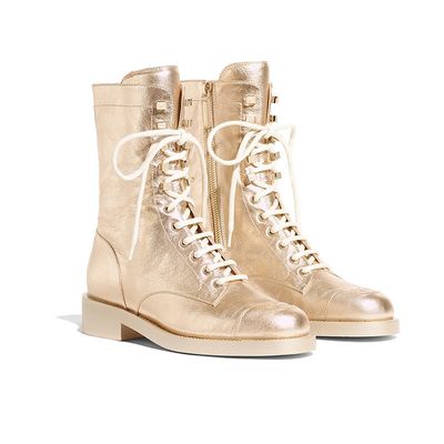 black and gold lace up boots