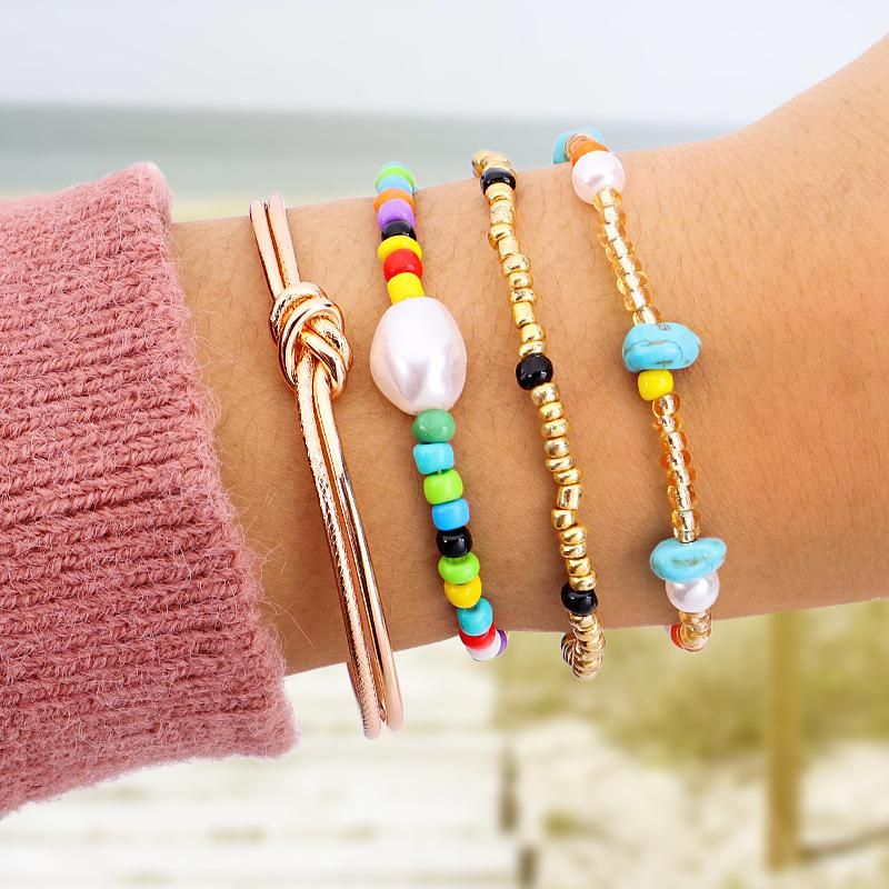 pulseras hechas a nudos de perlas pequeñas bolas de playa del verano