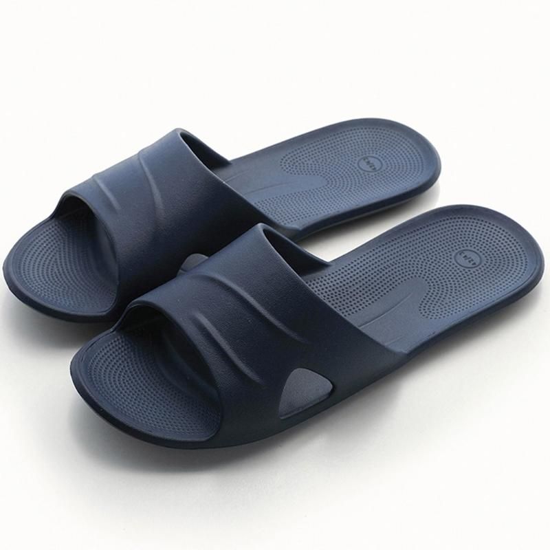 black plastic flip flops