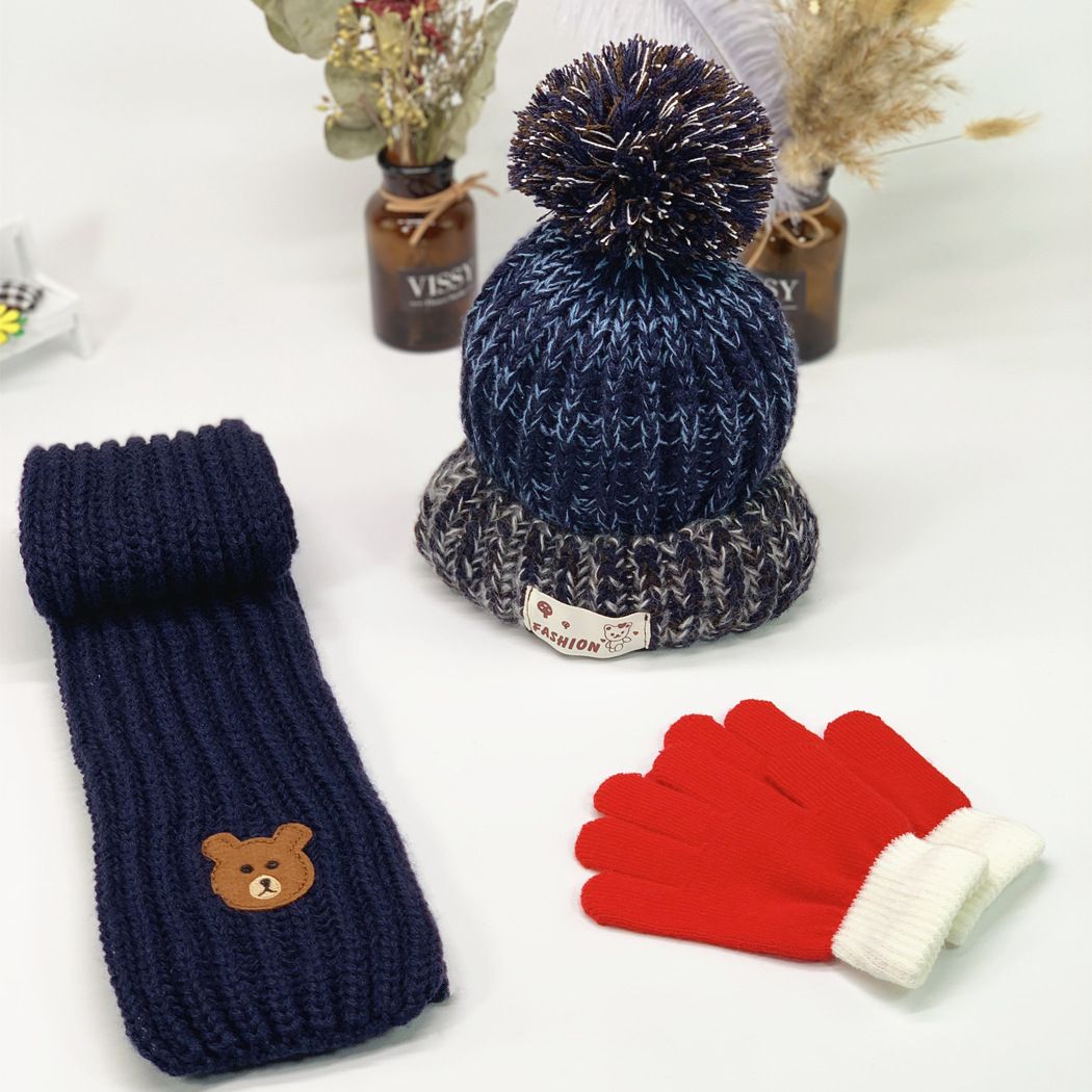 designer hat and gloves