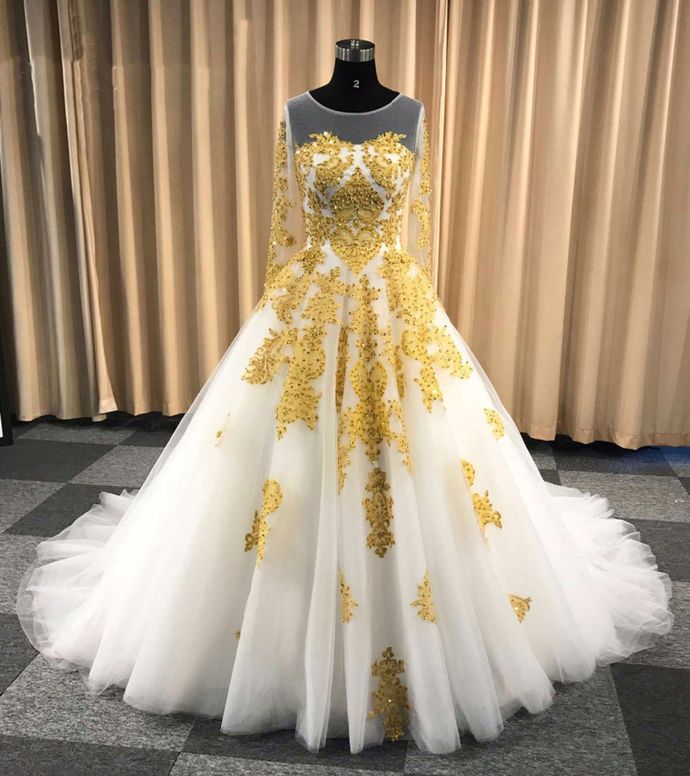 white and gold wedding gown