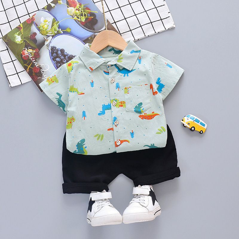 Compra Nuevo Verano Moda Niño Bebé Niños Niños Ropa Infantil Impresión De  Dibujos Animados Dinosaurio Camisa De Manga Corta + Pantalones Cortos  Conjuntos De Ropa Para Niños Barato | Entrega Rápida Y