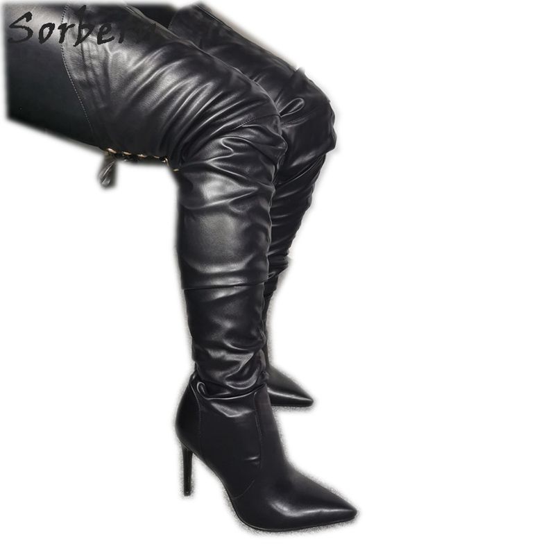mid thigh black boots