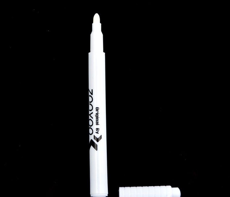 white liquid eraser