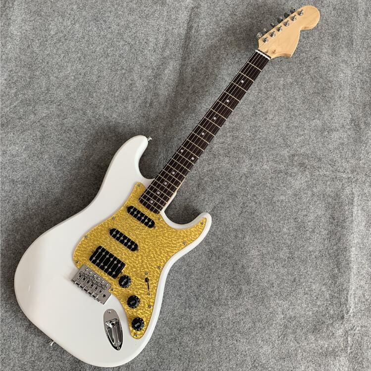 white toy guitar