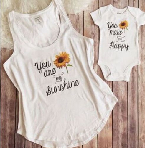 mother and newborn baby girl matching outfits