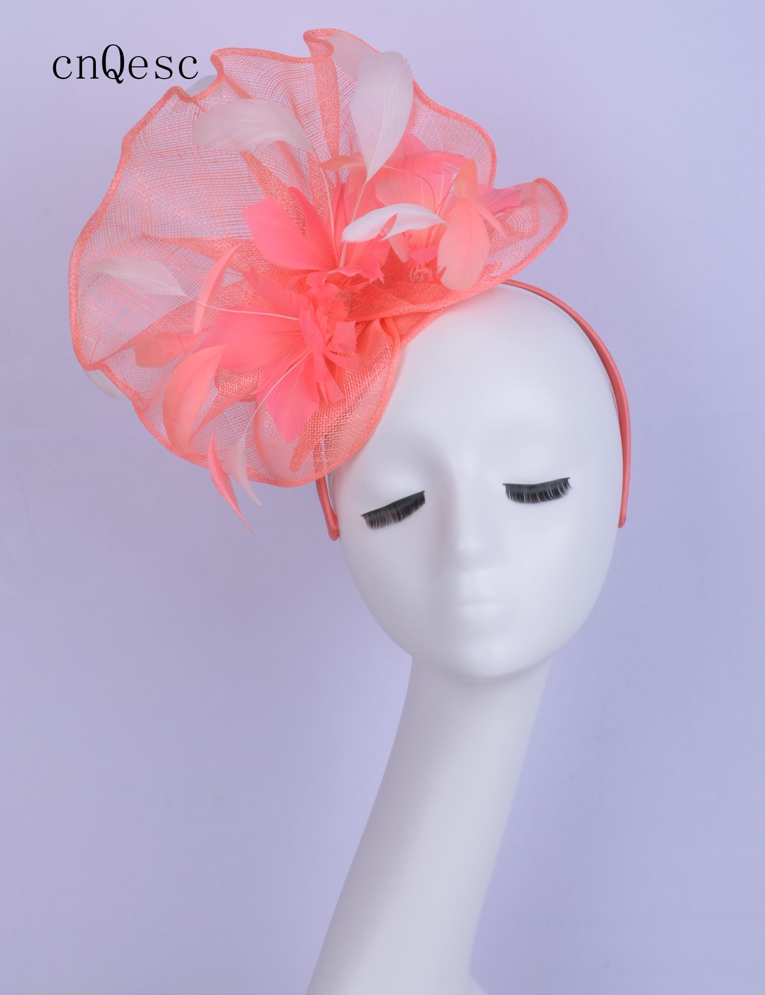 coral fascinator hat
