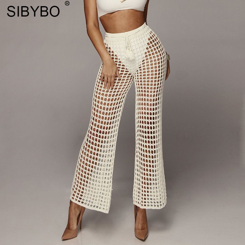 white crochet beach trousers