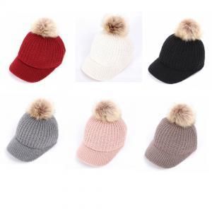 flat cap with pom pom