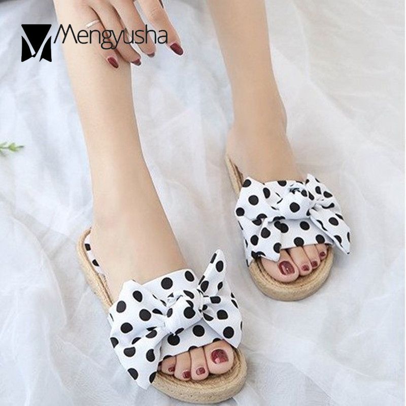 black and white polka dot flip flops