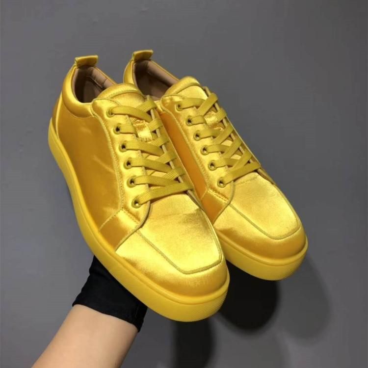 yellow red bottom sneakers