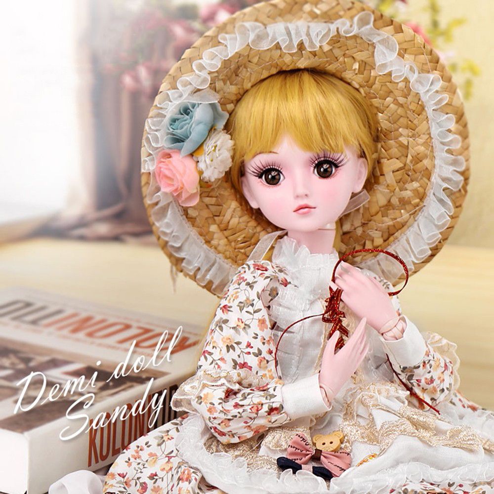muñeca 60 cm