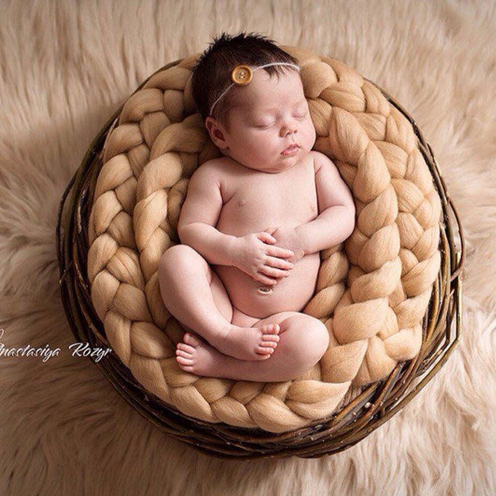 newborn baby in basket