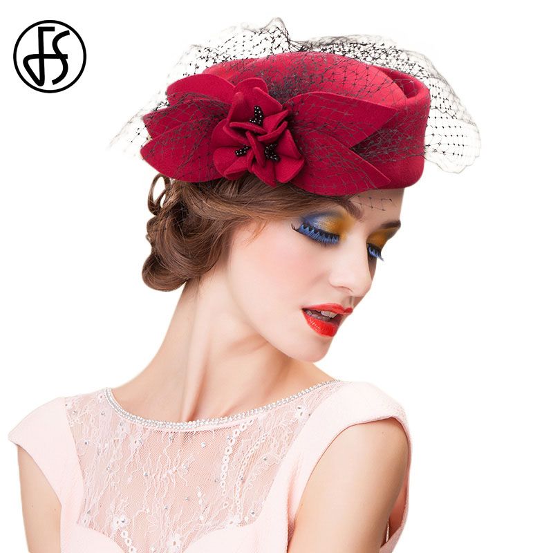 black fascinator hat with veil