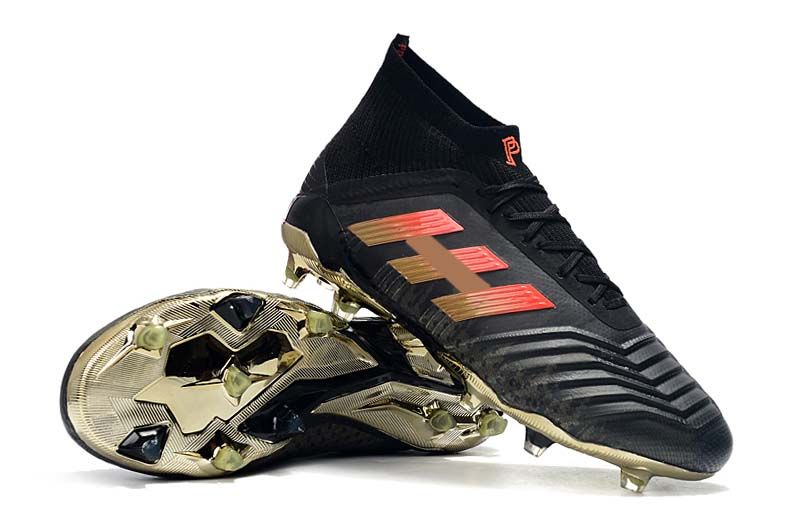 pogba boots black and gold