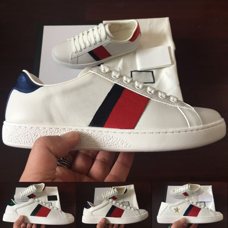 white trainers gold stars