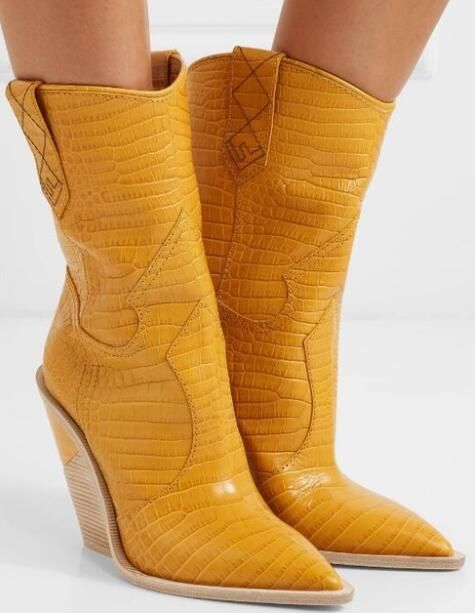 snakeskin wedge boots