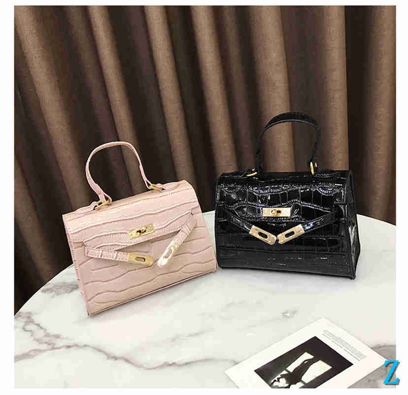 crocodile print handbags