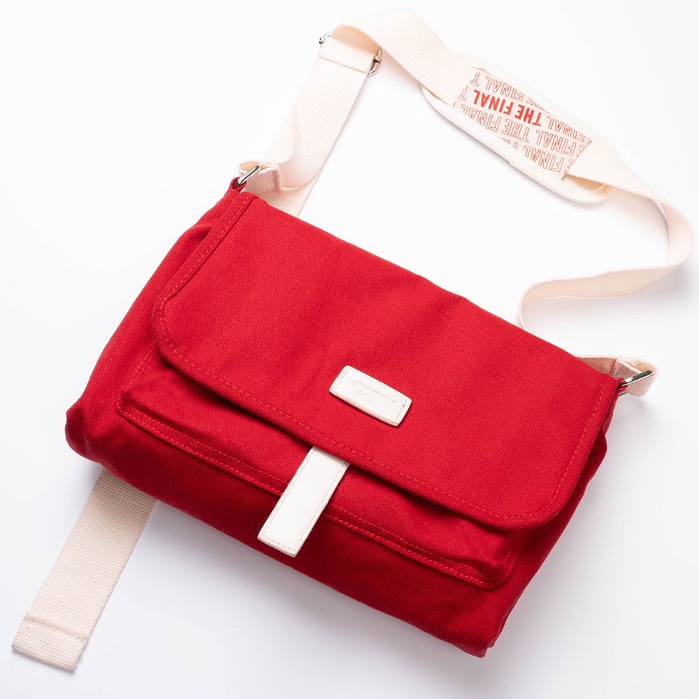 red canvas messenger bag
