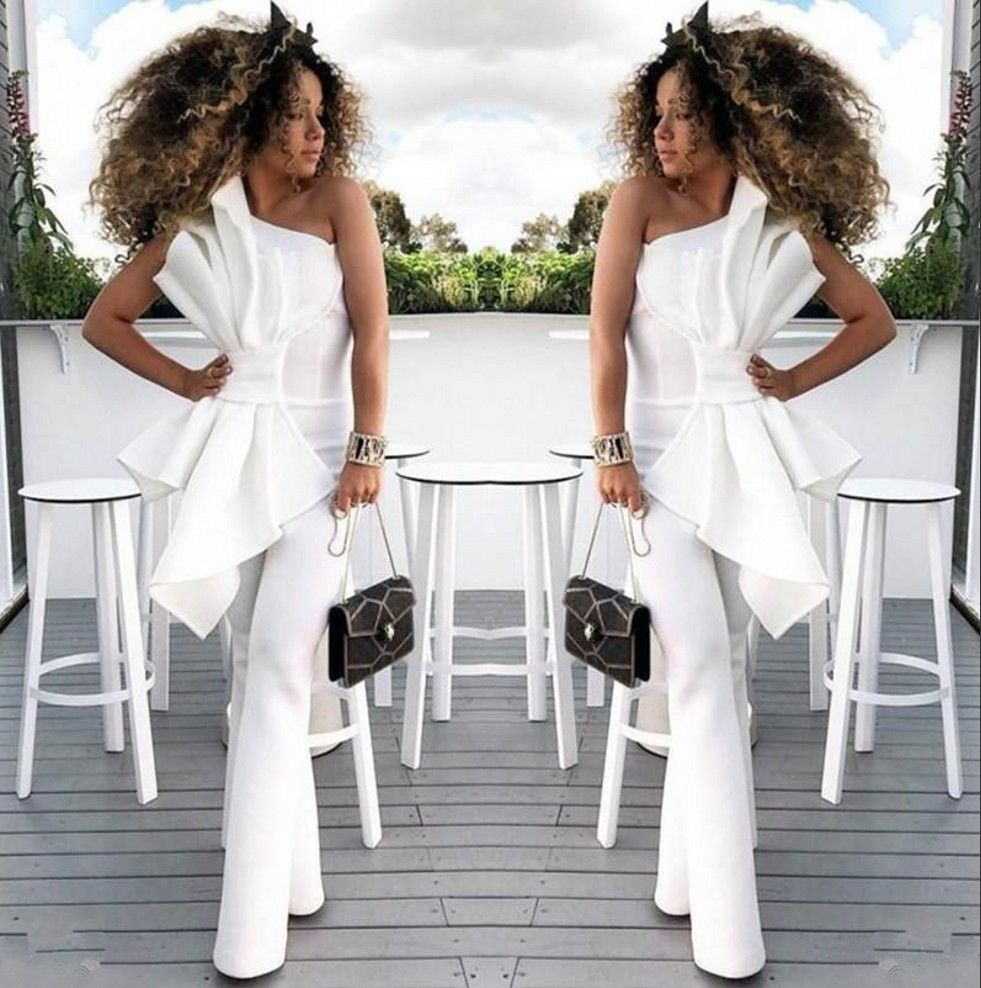 white jumpsuit with ruffles