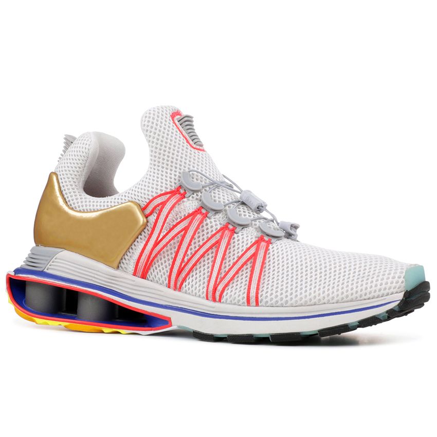 shox gravity metallic gold