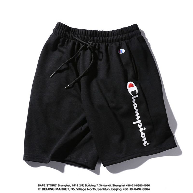 black shorts with yellow stripe