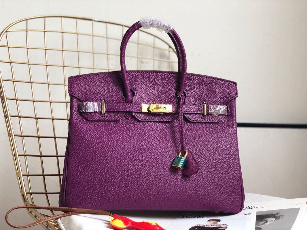 purple designer bag