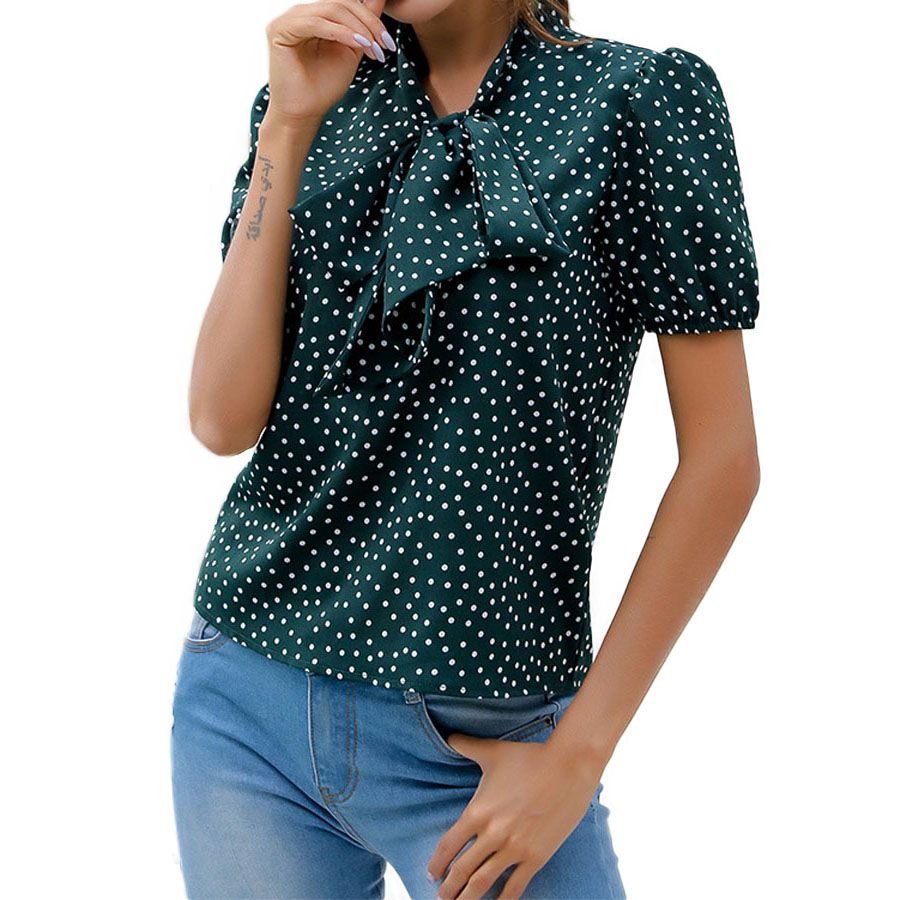 green polka dot shirt
