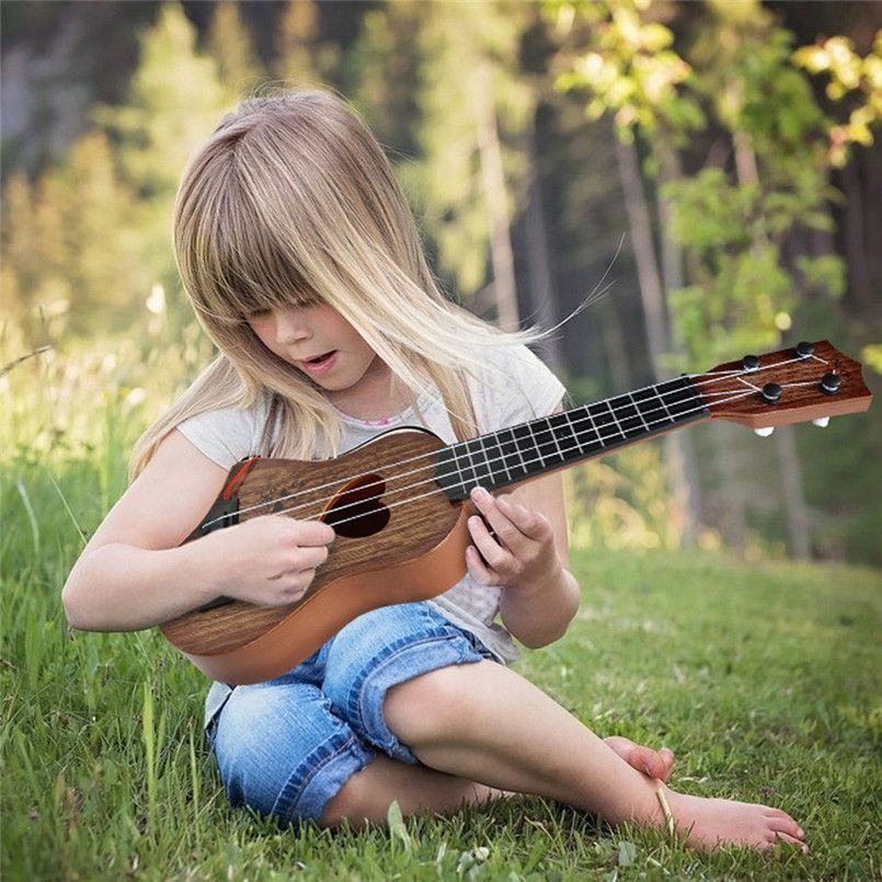 Compra Mini Principiante Clásico Seguro Simple Ukelele Guitarra 4 Cuerdas  Instrumento Musical Educativo Concierto Para Niños Regalo De Navidad Barato  | Entrega Rápida Y Calidad | Es.Dhgate
