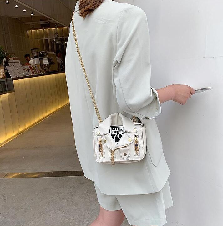 suit and messenger bag