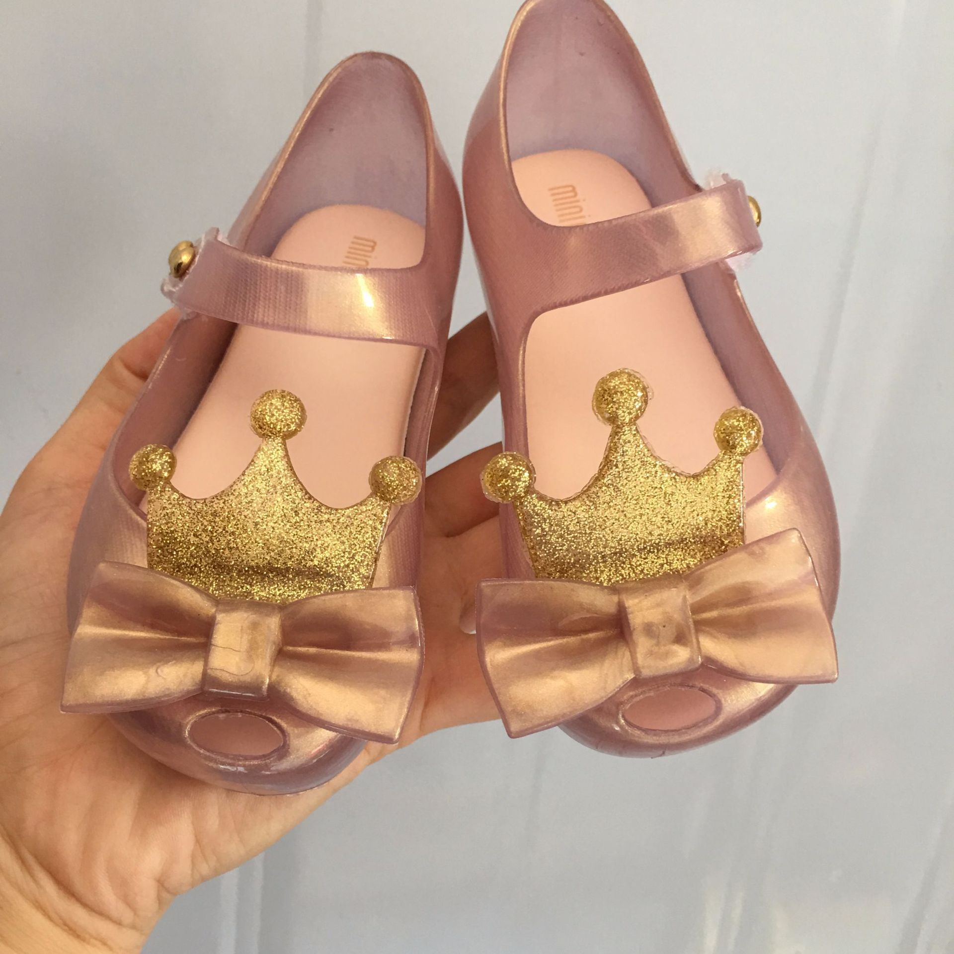 gold jelly shoes