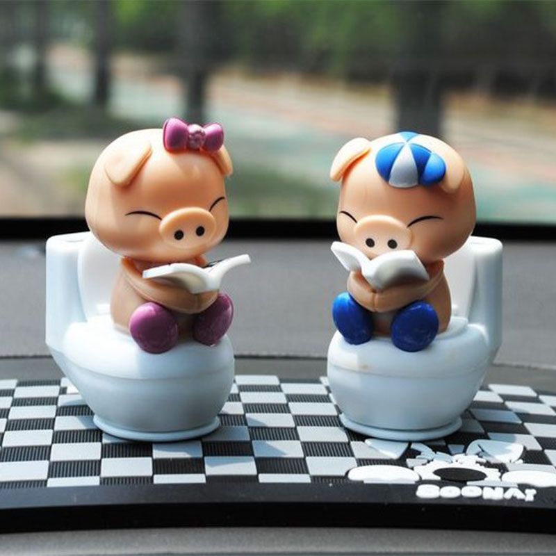 car dashboard doll