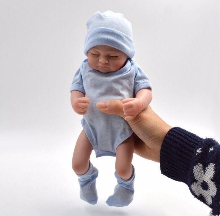 Compre 48cm feito à mão real olhando realista bebê recém-nascido