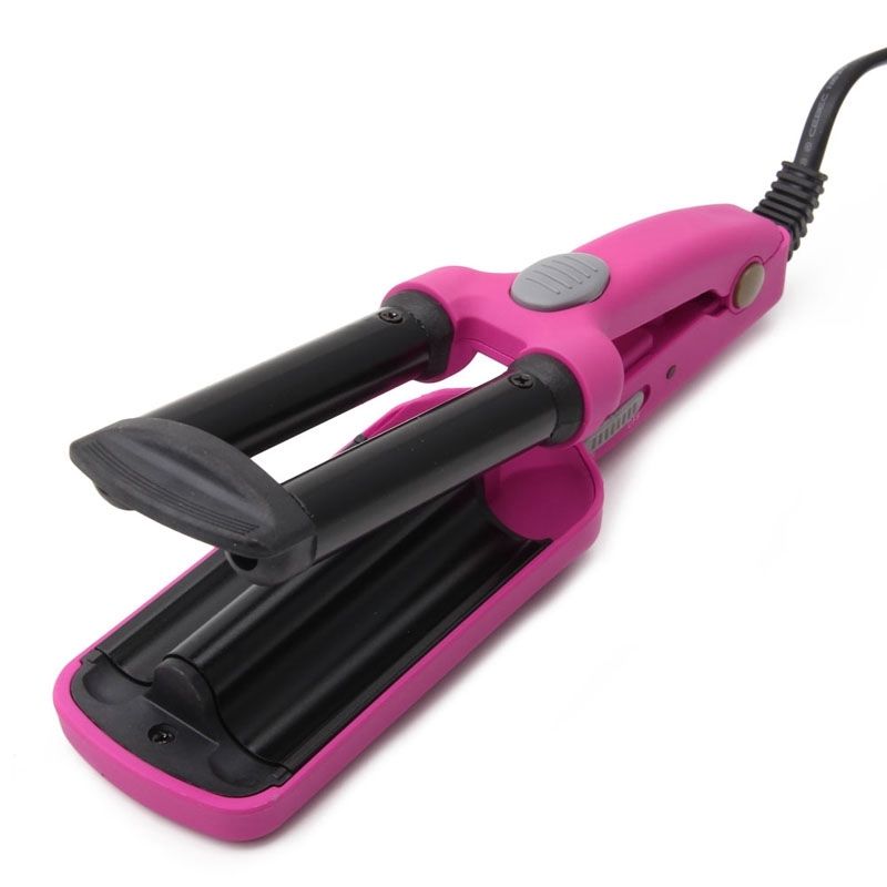 plugged in pink curling wand